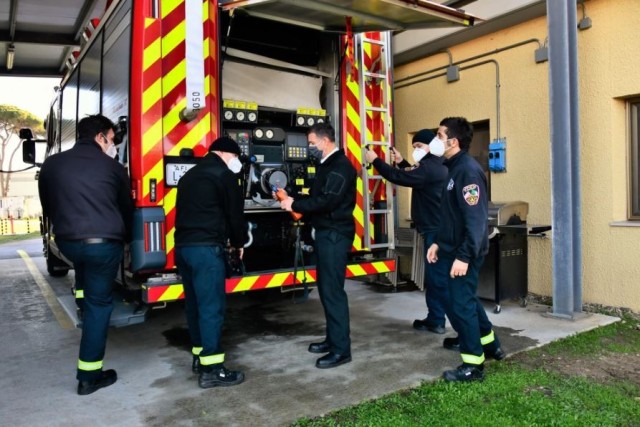 (From left to right) U.S. Army Garrison Italy’s Fire and Emergency Services Division Battalion Firefighters Emanuele Zumbo; Simone Ali; Manuel Cecere and Captain Matthew Dambacher assist Chief Brent Collins (center) while doing a check to the fire truck Jan. 14. Since his arrival, in November 2019, Collins ensured 24/7 emergency operations, responded to two off-base wildland fires threatening the post and protected more than $16.4 million deployable equipment. A few weeks ago, IMCOM-E awarded him as Fire Officer of the Year.

