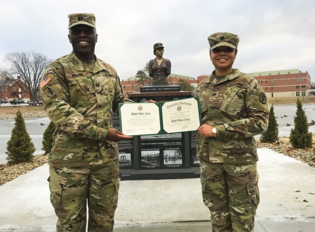 Sgt. Jennifer Jackson,  right, during her reenlistment ceremony at Fort Leavenworth, Kan. Jackson is currently the noncommissioned officer in charge of health physics for Public Health Command-Pacific at Camp Zama, Japan.
