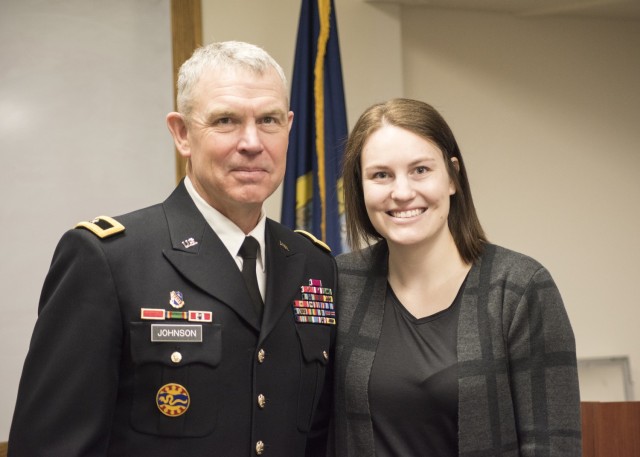 Idaho Army National Guard Brig. Gen. Russell Johnson and his daughter, 2nd Lt. Marah Sharpe, on Gowen Field in Boise, Idaho, Jan. 28, 2022, after Johnson administered the oath of commissioning to Sharpe. Russell is retiring from the Guard in March...