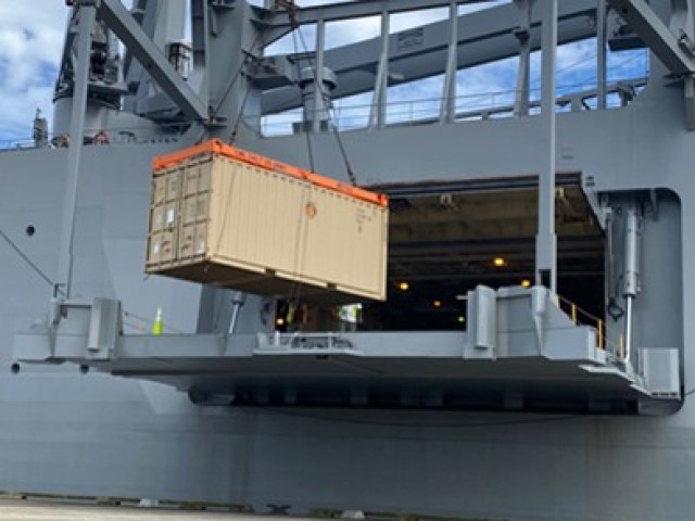 A Class IX repair parts container is loaded onto a Large, Medium - Speed Roll-on/Roll-off vessel at Wharf Alpha, Charleston, South Carolina, in preparation for future operations. The Army Field Support Battalion – Charleston, is responsible for the readiness and employment of critical power projection capability. 