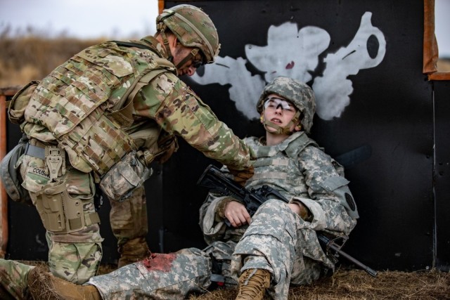 Staff Sgt. Caleb Cousins, Combat Medic Specialist, 25th Infantry Division, prepares a casualty for extraction during the Army&#39;s Best Medic Competition.