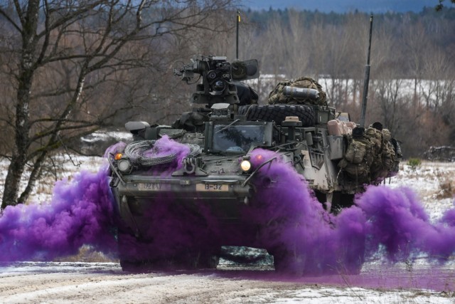 U.S. Soldiers, assigned to Bull Troop, 1st Squadron, 2nd Cavalry Regiment, maneuver a Stryker armored vehicle during a situational training exercise at the 7th Army Training Command&#39;s Grafenwoehr Training Area, Germany, Jan. 11, 2022.
