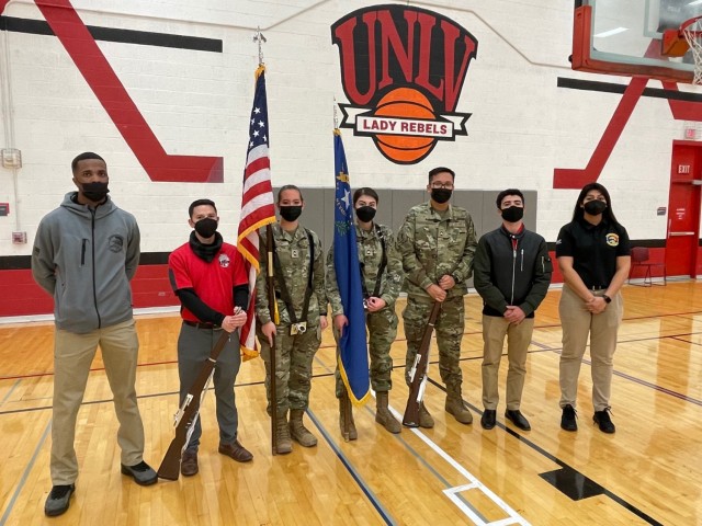 Members of a Joint Armed Forces Color Guard conduct a clinic for University of Nevada, Las Vegas Army and Air Force ROTC cadets Feb.4, 2022. The servicemembers from the National Capital Region are in Las Vegas to represent the Department of Defense during the national anthem of the NFL Pro Bowl. 