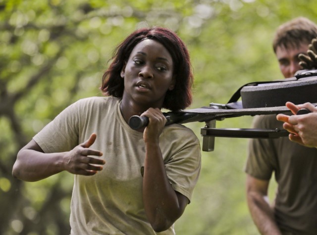 Staff Sgt. Sharonica White, a religious affairs specialist assigned to U.S. Army Garrison Japan, participates in a litter carry as part of a competition in celebration of the Army birthday June 8, 2020. White was recently selected to attend...