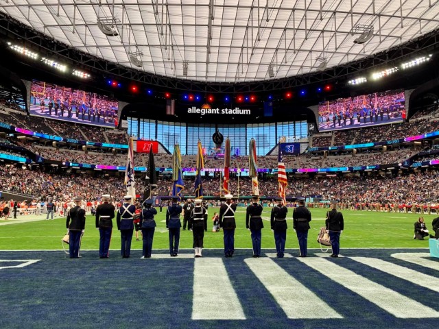 Service members from the National Capital Region present the colors during the national anthem at the NFL Pro Bowl February 6, 2022