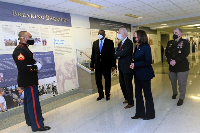 Marine Corps Lance Cpl. Kordell Waklatski serves as a tour guide for President Joseph R. Biden Jr., Vice President Kamala Harris, Secretary of Defense Lloyd J. Austin III, and Chairman of the Joint Chiefs of Staff Army Gen. Mark A. Milley as they visit the African Americans in Service corridor that honors the contributions of African American service members, the Pentagon, Washington, D.C., Feb. 10, 2021. (DoD photo by Lisa Ferdinando)