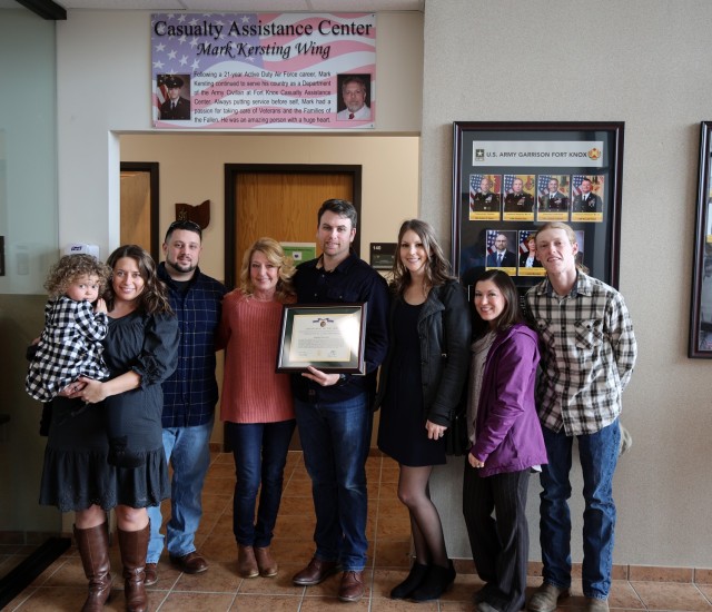 Family of former Casualty Assistance Center employee attends tear-filled wing naming ceremony