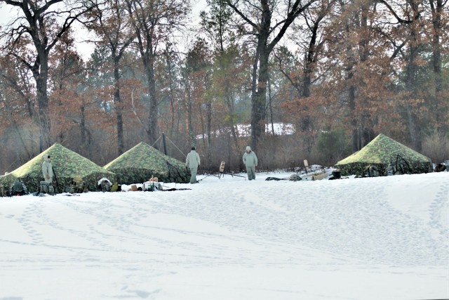 Cold-Weather Operations Course class 22-03 students build Arctic tents on Fort McCoy&#39;s South Post