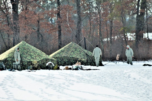 Cold-Weather Operations Course class 22-03 students build Arctic tents on Fort McCoy&#39;s South Post