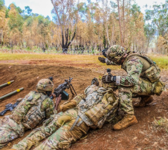 U.S. Army 1st Lt. Thomas H. Tockarshewsky assigned to Alpha Company &#34;Sapper&#34; 2nd Infantry Brigade Combat Team, 25th Infantry Division, gives guidance to his grappling man during a combined arms live-fire exercise at Schofield Barracks, Hawaii, June 24, 2020. The exercise is part of an overall training progression in order to maintain combat readiness in preparation for a Joint Readiness Training Center rotation later this year. (U.S. Army photo by 1SG Lekendrick Stallworth)