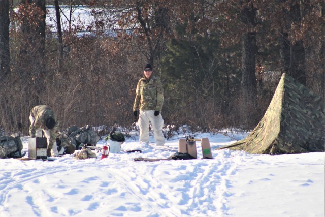 Cold-Weather Operations Course class 22-03 students build Arctic tents on Fort McCoy&#39;s South Post