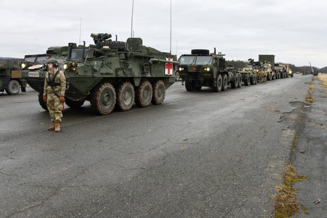 Various tactical vehicles assigned to the 2nd Squadron, 2nd Cavalry Regiment await to be loaded onto trucks at the 7th Army Training Command’s Rose Barracks Air Field, Vilseck, Germany, Feb. 9, 2022. The Squadron will deploy to Romania in the...
