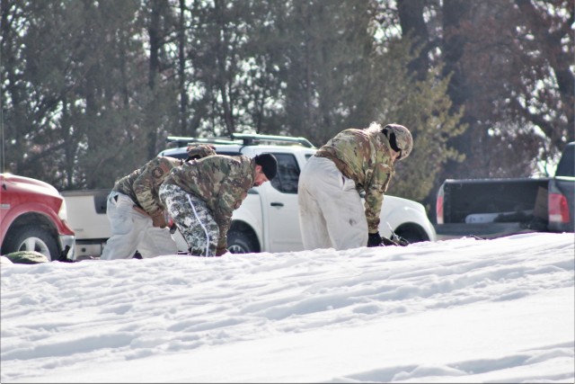Cold-Weather Operations Course class 22-03 students build Arctic tents on Fort McCoy&#39;s South Post