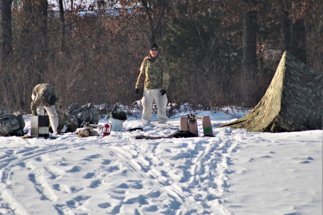 Cold-Weather Operations Course class 22-03 students build Arctic tents on Fort McCoy&#39;s South Post
