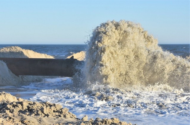 Coastal storm splits an island and brings communities together