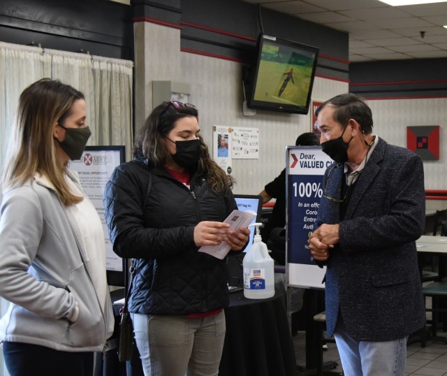 Fred Moore,  Chief of USAG Daegu&#39;s Housing Division, speaks to members of the community near an information table at Camp Walker, South Korea. The information table was set up in support of the 2022 Department of Defense Annual Family Housing...