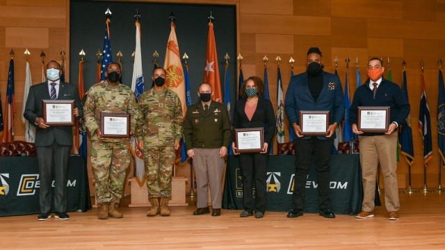 The U.S. Army Combat Capabilities Development Command, or DEVCOM, hosted the Aberdeen Proving Ground Black History Month Celebration on February 15, 2022. The panelists were presented with a certificate of appreciation from Maj. Gen. Miles Brown, DEVCOM commanding general. 

From left to right: Dr. Eric Moore, director, DEVCOM Chemical Biological Center; CW5 Linc McCoy, command chief warrant officer, U.S. Army Communications-Electronics Command; Maj. Gen. Robert Edmondson II, CECOM commanding general and senior commander APG; Maj. Gen. Brown; Dr. Reygan Freeney, division chief, U.S. Army Aberdeen Test Center; Rodney Morgan, mechanical engineer, DEVCOM Aviation & Missile Center; and Jeff Thomas, deputy director, DEVCOM Science & Technology Integration Directorate.