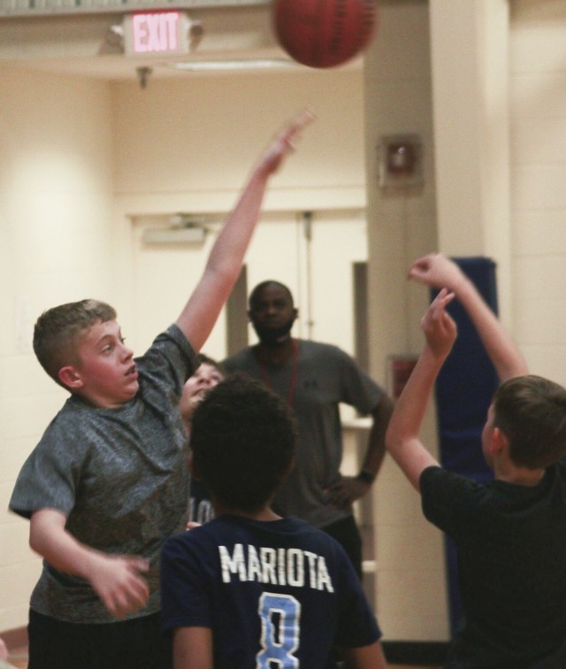 Get in the game: Military kids connect through basketball league