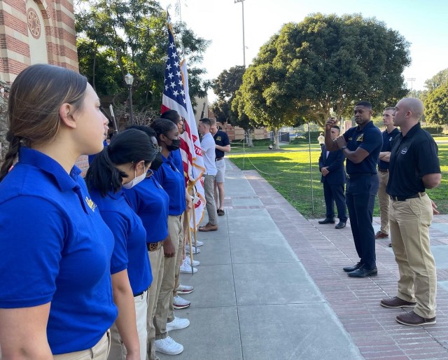 Service members from the National Capital Region conduct a skills clinic for the U.S. Army and U.S. Air Force ROTC cadets at University of California Los Angeles, February 11, 2022. The team was in California to present the colors during the national anthem at Super Bowl LVI.