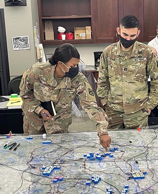 Maj. Marie Okoro, a Medical Service Corps officer and a member of the Army Reserve, works on a tabletop exercise at Intermediate Level Education June 29, 2021, at the Command and General Staff School, Fort Leavenworth, Kansas. 