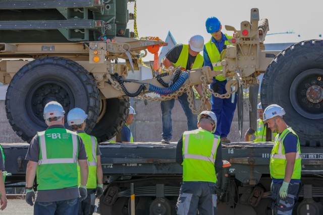 Rail workers load vehicles from the 101st Airborne Division, 101st Combat Aviation Brigade onto rail cars July 12, 2020, in La Rochelle, France. The 101st CAB is the sixth aviation rotation for Atlantic Resolve, and the 101st will deploy approximately 2,000 personnel, 50 UH-60 and HH-60 Black Hawks, four CH-47 Chinooks, 25 AH-64 Apaches and more than 1,800 wheeled vehicles and pieces of equipment. This is the first time a U.S. Army operation of this scale has been conducted in La Rochelle since the 1960&#39;s. 