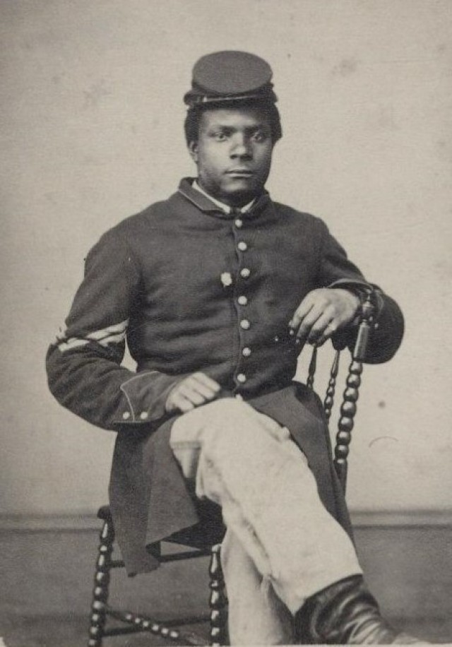 Kendrick Allen was born enslaved in Anderson County, Kentucky. Evidence suggests that he escaped to join the Union Army in 1864 and spent two years in the 108th U.S. Colored Troops at various posts, Including as a guard at Rock Island Prison Barracks.