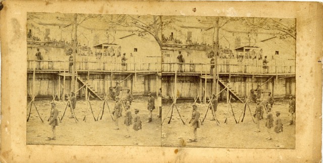 Stereoscope image of members of 108th U.S. Colored Troops at Rock Island Prison Barracks ca. 1864.