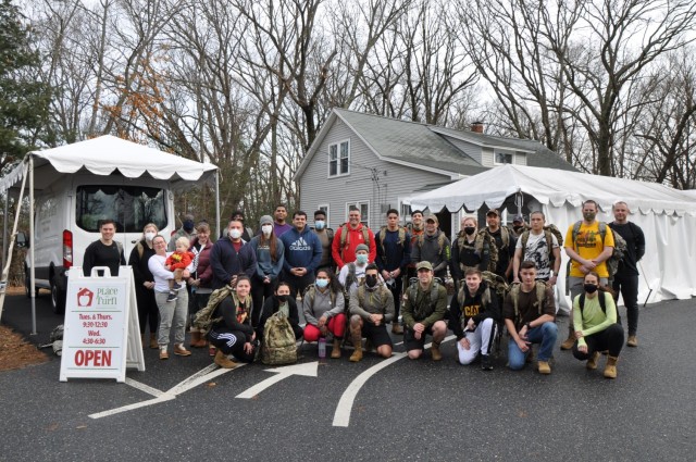 USARIEM marches with over 800 pounds of canned goods for food drive