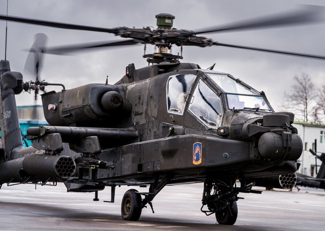 An AH-64D Apache Longbow helicopter assigned to 1-3rd Attack Battalion, 12th Combat Aviation Brigade, prepares for take-off at Katterbach Army Airfield, Germany, Feb. 15, 2022. Elements of the 12 CAB are departing Germany for Lithuania and Latvia to conduct training with NATO allies. 12 CAB trains and remains a constant and credible U.S. Army aviation force in support of allies and partners and the stability and security of Europe.