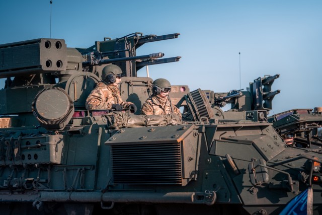 Soldiers, assigned to 5th Battalion, 4th Air Defense Artillery Regiment, move out in their maneuver short-range air-defense vehicle during Exercise Saber Strike 22 at BPTA, Poland, Feb. 24, 2022.