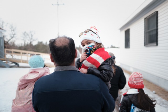 The last family of Afghan guests is shown departing Fort McCoy, Wis., on Feb. 15, 2022, to end the Operation Allies Welcome mission at the post. The Department of Defense, through U.S. Northern Command, and in support of the Department of Homeland...