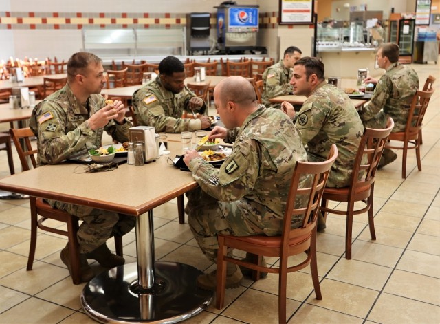 Soldiers enjoy their lunches at Cantigny Dining Facility Feb. 28, 2022 during the Black History Month meal.