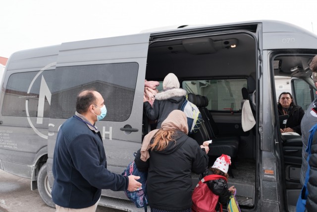 The last family of Afghan guests are shown departing Fort McCoy, Wis., on Feb. 15, 2022.  The Department of Defense, through U.S. Northern Command, and in support of the Department of Homeland Security, is providing transportation, temporary housing, medical screening, and general support for at least 50,000 Afghan guests at suitable facilities, in permanent or temporary structures, as quickly as possible. This initiative provides Afghan guests essential support at secure locations outside Afghanistan. (U.S. Army photo by Sgt. Robert P Wormley III, 50th Public Affairs Detachment)