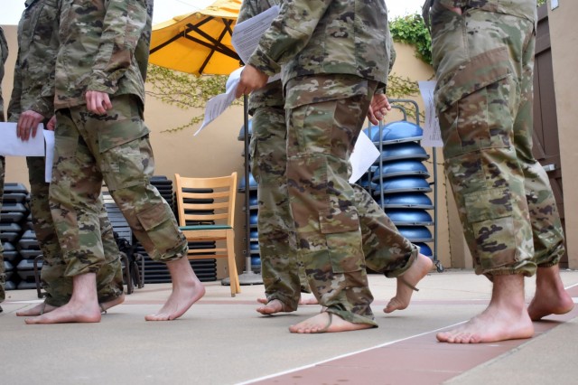 Service members from the Defense Language Institute Foreign Language Center and Naval Postgraduate School took the 100-meter swim test for the German Armed Forces Badge for Military Proficiency at the Monterey Sports Center, Monterey, Calif.,...