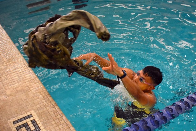 Service members from the Defense Language Institute Foreign Language Center and Naval Postgraduate School took the 100-meter swim test for the German Armed Forces Badge for Military Proficiency at the Monterey Sports Center, Monterey, Calif., Sept. 10, 2021. 