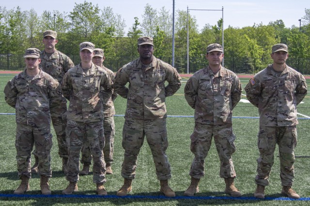 10th Mountain Division ((LI) Soldiers are awarded their Expert Infantryman Badges (EIB) at Magrath Sports Complex after fulfilling all their prerequisites during a weeklong certification at Fort Drum, NY, May 21, 2021. The EIB was created during World War II. (U.S. Army photos by Spc. Pierre Osias)