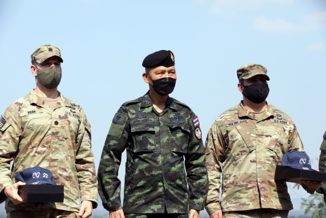 U.S. Army Lt. Col. Duke Reim (left), Royal Thai Armed Forces Deputy Chief of Defense Forces Gen. Supachok Thawatperachai, U.S. Army Maj. Curt Belohlavek (right), conclude a ceremony after the dry fire exercise as part of Cobra Gold 2022 in the Lopburi Province of the Kingdom of Thailand, Feb. 26, 2022. CG 22 is the 41st iteration of the international training exercise that supports readiness and emphasizes coordination on civic action, humanitarian assistance, and disaster relief. From Feb. 22 through March 4, 2022, this annual event taking place at various locations throughout the Kingdom of Thailand increases the capability, capacity, and interoperability of partnered nations while simultaneously reinforcing our commitment to a free and open Indo-Pacific. (U.S. Army photo by Spc. Andrew Mendoza)
