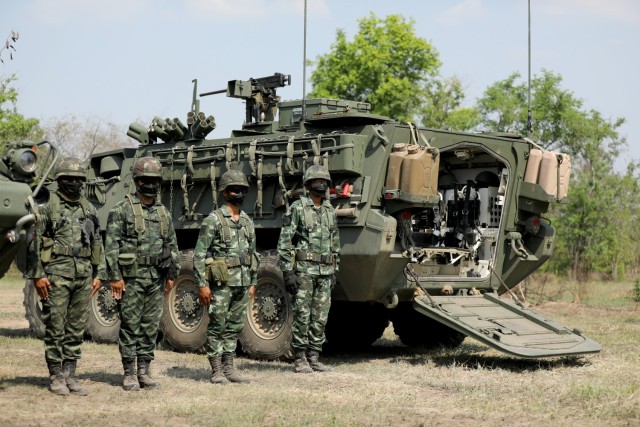Members of the 112th Infantry Regiment, Royal Thai Army, standby for vehicle inspection on the M1129 Stryker Mortar system as part of Cobra Gold 2022 in the Lopburi Province of the Kingdom of Thailand, Feb. 26, 2022. CG 22 is the 41st iteration of the international training exercise that supports readiness and emphasizes coordination on civic action, humanitarian assistance, and disaster relief. From Feb. 22 through March 4, 2022, this annual event taking place at various locations throughout the Kingdom of Thailand increases the capability, capacity, and interoperability of partnered nations while simultaneously reinforcing our commitment to a free and open Indo-Pacific. (U.S. Army photo by Spc. Andrew Mendoza)