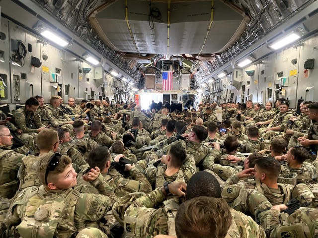 National Guard Soldiers from the Minnesota-based 34th Infantry Division pack a U.S. Air Force-operated C-17 in August 2021following the completion of their mission in Kabul, Afghanistan. (Photo by Cpl. Bridget Haugh)