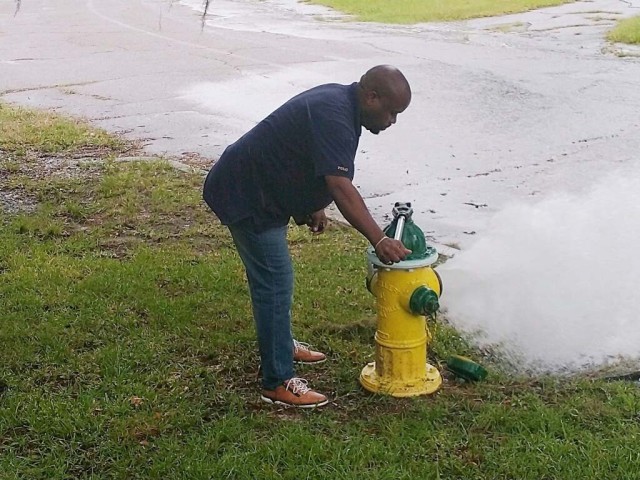 Nathaniel Williams, Aerostar Water Compliance Manager, flushing water within the distribution system to improve quality. Flushing water in the distribution system can also improve taste and odor therefore minimizing water complaints.