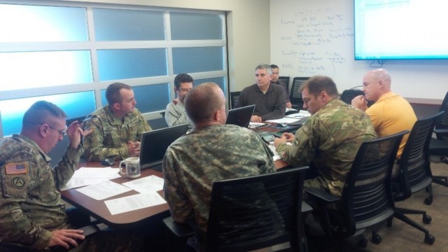 The cross-functional team comprised of members of the Colorado National Guard and State Department of Military and Veterans Affairs work together on the environmental management system (EMS) priorities, March 2017.  The Colorado Army National Guard eMS identified significant impact of energy consumption and is working to develop approaches for reduction strategies to reduce carbon footprint.