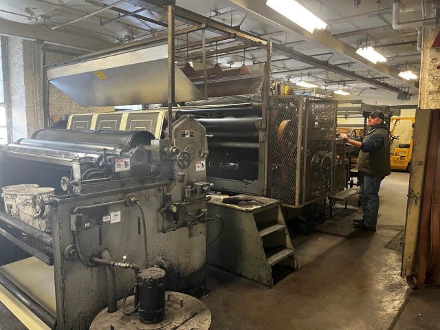 Defense Logistics Agency Document Services employee Jerad Vogt runs a one-of-a kind Flexo graphic printing press to print 25-meter silhouette targets at a DLA printing facility at Rock Island Arsenal, Illinois, March 11, 2022.