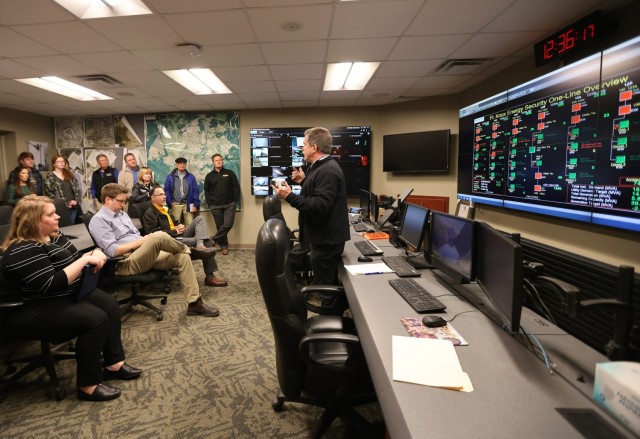 Fort Knox Energy Program manager R.J. Dyrdek shows University of Kentucky staff and students the heart of the installation Energy Program operations March 16, 2022.