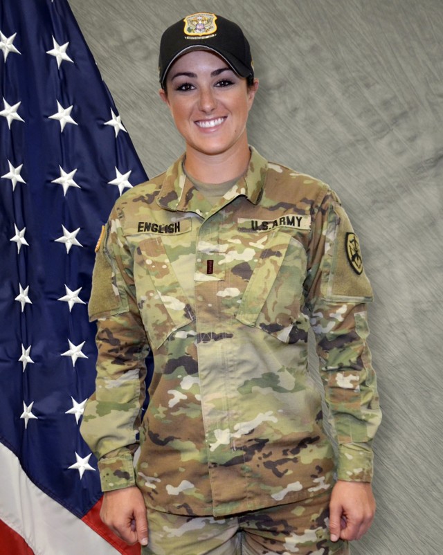 Army 1st Lt. Amber English, an olympic gold medalist, poses for a photo while wearing her Army uniform.