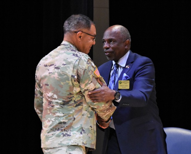 N.C. Department of Military and Veteran Affairs Secretary Walter E. Gaskin thanks Gen. Michael X. Garrett, U.S. Army Forces Command Commanding General, for his time and words of wisdom during the 2nd North Carolina ROTC Roundtable at Fayetteville...