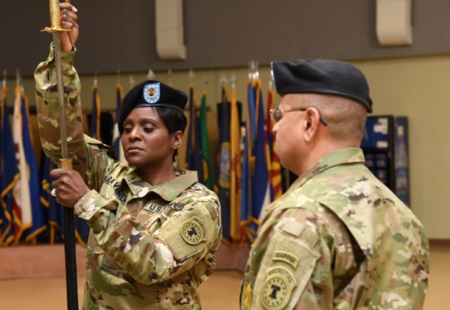 Command Sgt. Maj. Latosha Ravenell, the then-incoming command sergeant major of the New York City Recruiting Battalion, receives the noncommissioned officer’s sword during the battalion’s change of responsibility ceremony, Brooklyn, New York, Feb, 23, 2018. Ravenell is currently the command sergeant major of the Army Marketing and Engagement Brigade at Fort Knox, Kentucky. 