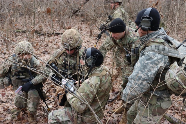 Paratroopers with C Company, 1-508th Parachute Infantry Regiment, 82nd Airborne Division (Air Assault) assess the Integrated Tactical Network while performing an air assault exercise in January 2019 at Camp Atterbury, Indiana. The ITN features both single channel and two-channel radio variants.