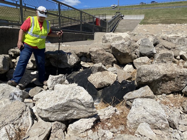 Susan Abbott inspects rip rap at Rathbun Lake