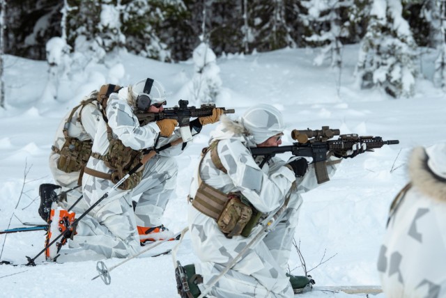 Airmen with the Kentucky Air National Guard’s 123rd Special Tactics Squadron fire their M4 rifles while on skis at a range in Grubbnäsudden, Sweden, Jan. 13, 2022. Fifteen members from the 123rd STS came to Sweden to build on their relationship...