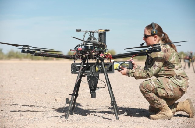 Staff Sgt. Elise Denning, assigned to Artificial Intelligence Integration Center, conducts maintenance on an unmanned aerial system in preparation for Project Convergence at Yuma Proving Ground, Arizona, on Oct. 20, 2021.

Undersecretary of the Army Gabe Camarillo said that the service will continue to focus on modernization in its fiscal year 2023 budget including Project Convergence, the Army&#39;s series of joint, multi-domain operations. 